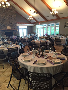 Tables set up for wedding at Durand Eastman Clubhouse