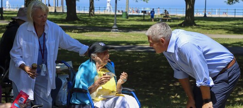 Picture of elderly couple playing cards.
