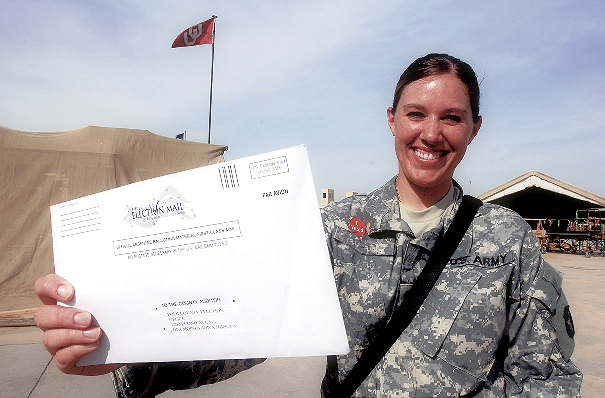 Soldier with Absentee Ballot Pic