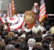 Picture of candidate at town hall meeting.