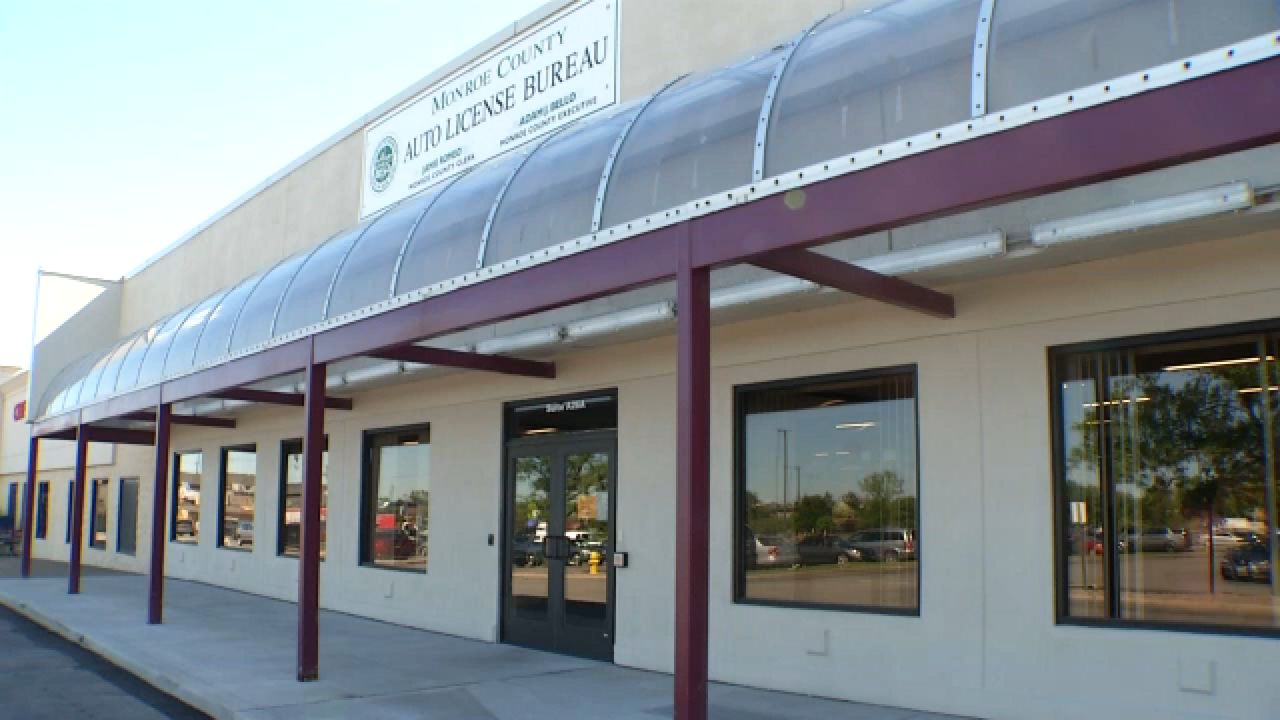 Picture of the Henrietta Auto License Bureau sign.