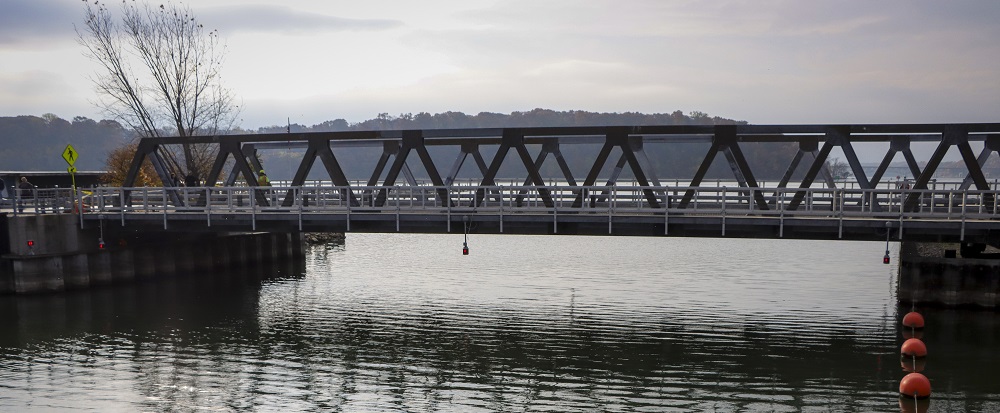 Photograph of a bridge above water