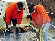 Picture of MCDOT bridge crew employees making way for the new Stuart Rd. Bridge.