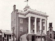 Historic picture of the first Courthouse (County Office Building).