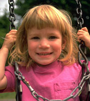 Image of child on swing