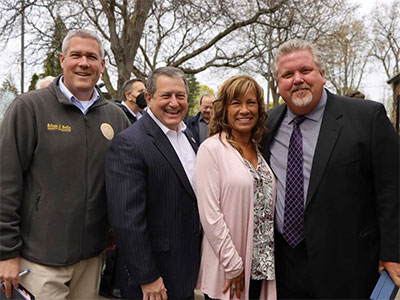 Photo of Adam Bello, Joe Morelle, Steven Olschewski, and Marsina Olschewski