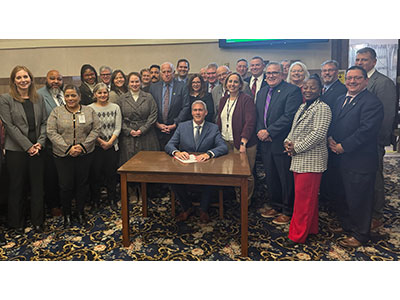 Photo of Bello and legislature