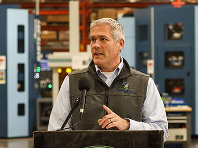 Photo of Adam Bello from press conference
