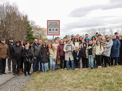 Photo of Gathering Around Sign