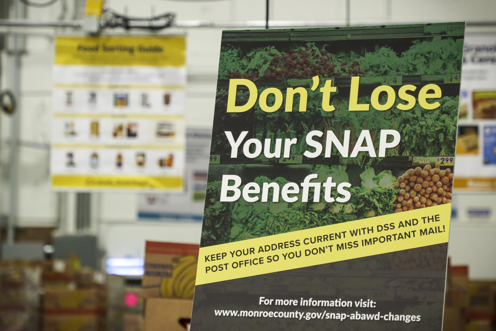 Sign Reading "Don't Lose Your SNAP Benefits"