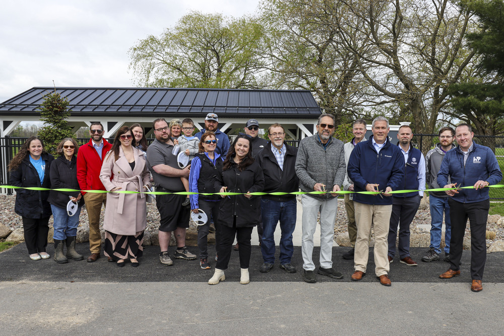 Photo of ribbon cutting at press conference