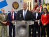 Photo of Adam Bello from press conference